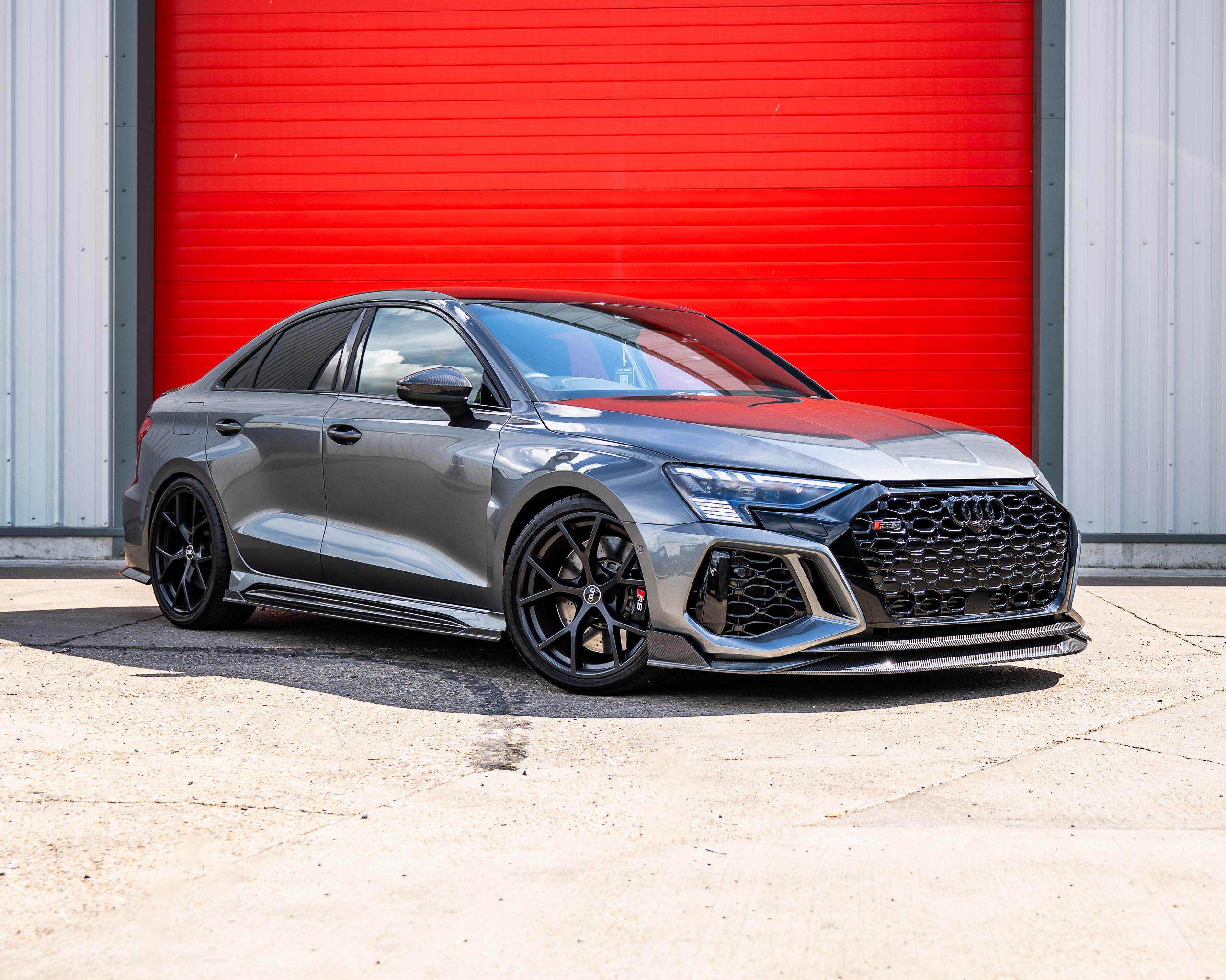 Win This Audi RS3 Carbon Black Saloon + £2,000 Cash!