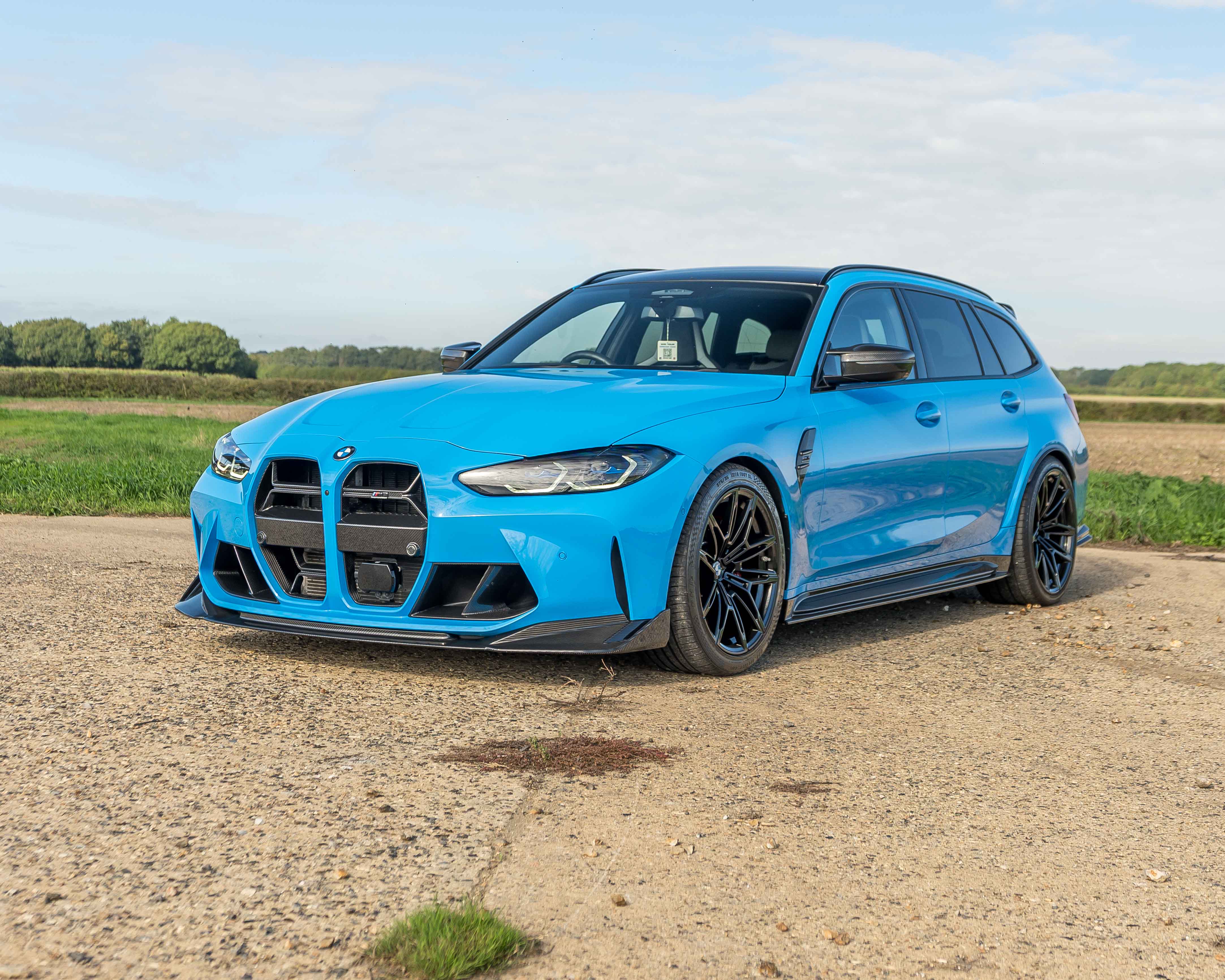Win This 2024 BMW M3 Competition Touring + £2,000 Cash!